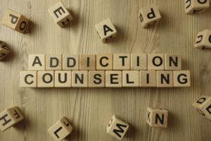 addiction counseling on wood blocks