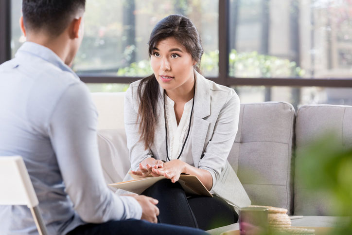 understanding counselor listening to male patient