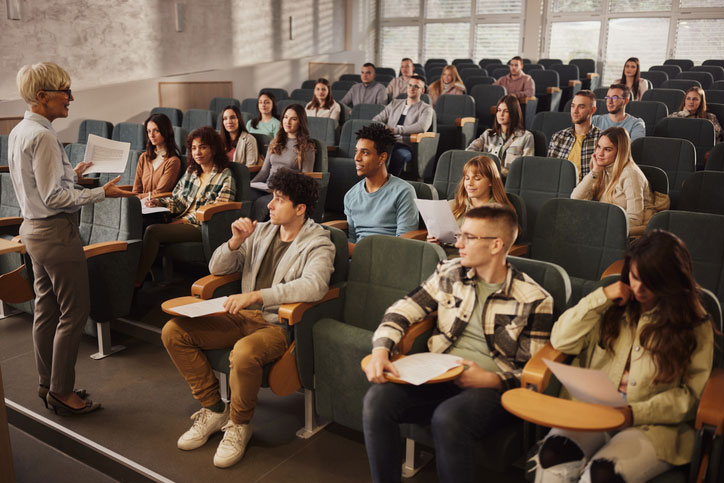attentive students in large lecture hall