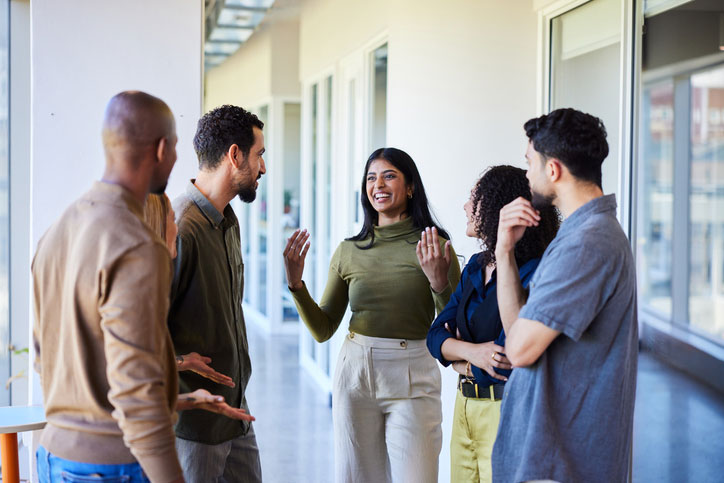 group talking outside after meeting