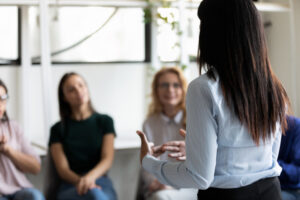 patients gathered together listening counselor