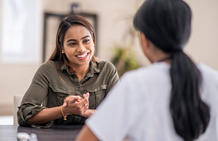 talking with counselor in office