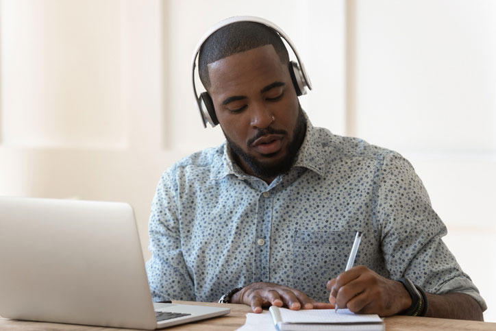 man studying online