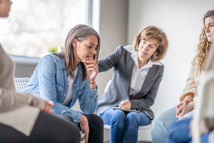 therapist comforting patient