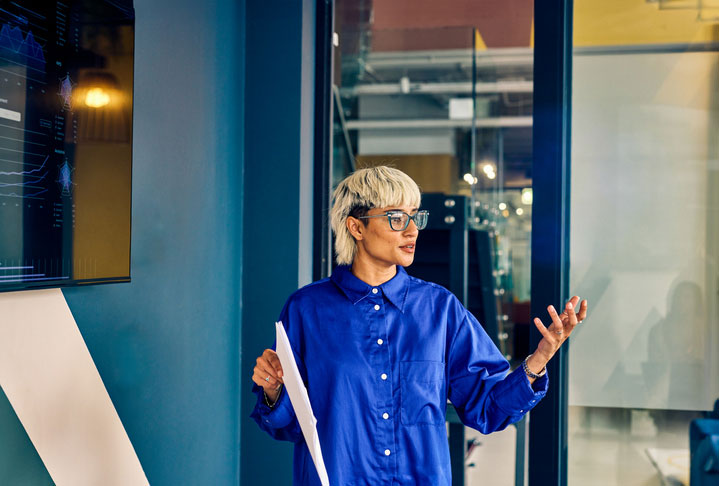 professional woman instructing in conference room