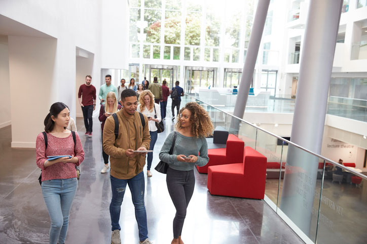 students walking and talking between classes