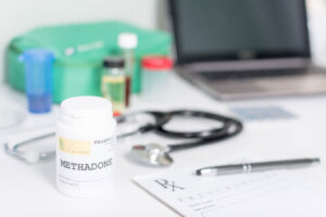 pill bottle on doctor's desk