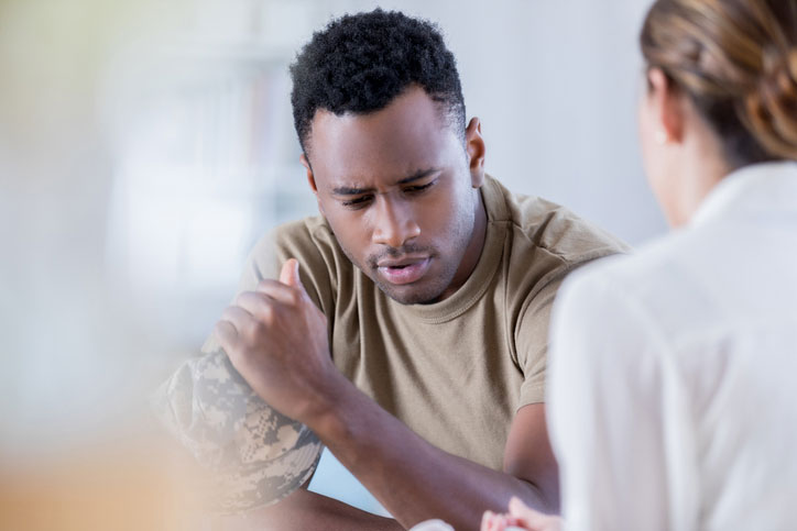 military veteran talking with counselor