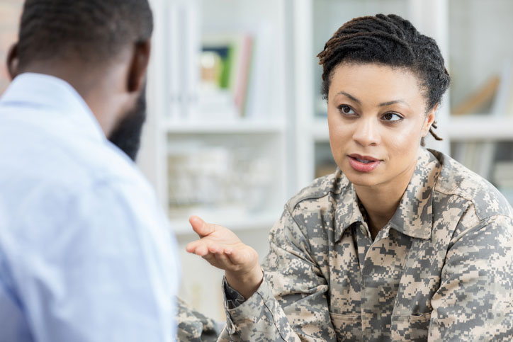 female soldier talking with counselor