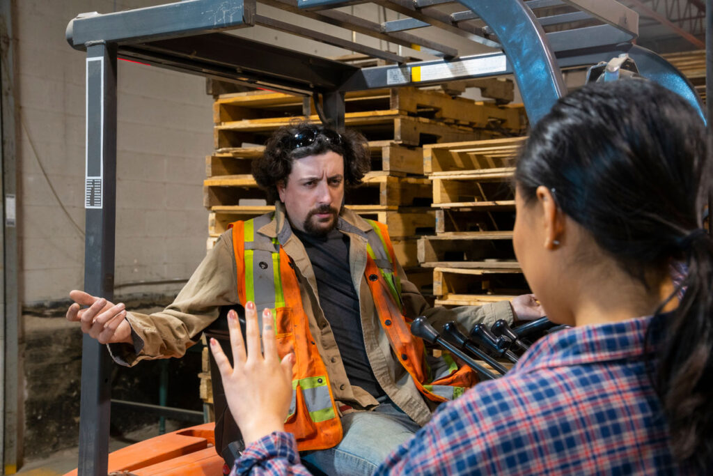 workers arguing in loading dock